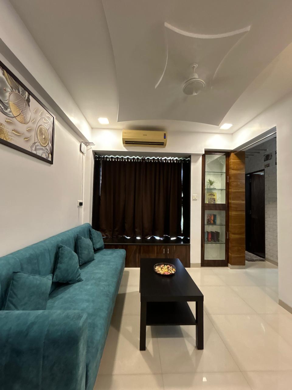 Living room teal sofa